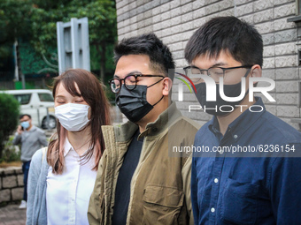 Hong Kong activists Agnes Chow, Ivan Lam and Joshua Wong enter West Kowloon court to plead guilty to unlawful assembly charges. All have bee...