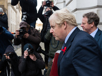 British Prime Minister Boris Johnson returns to Downing Street in central London after attending weekly Cabinet meeting held at the Foreign...