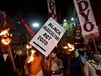 All India Democratic Youth Organization (AIDYO) organized a torch rally against the the Central Govt. during a farmers' protest march to Del...