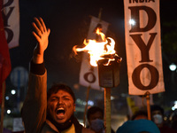 All India Democratic Youth Organization (AIDYO) organized a torch rally against the the Central Govt. during a farmers' protest march to Del...