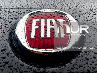 Raindrops are seen on the Fiat car logo in Poland on November 27, 2020. (