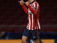 Joao Felix of Atletico Madrid celebrates after scoring his sides first goal during the UEFA Champions League Group A stage match between Atl...