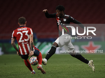 Arrey-Mbi of Bayern controls the ball during the UEFA Champions League Group A stage match between Atletico Madrid and FC Bayern Muenchen at...