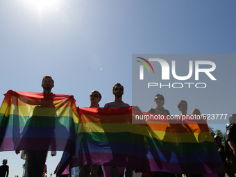 Participants of Kyiv Equality March 2015 walk by the city with rainbow flags, shouting equality slogans. Kyiv Equality March 2015, organized...