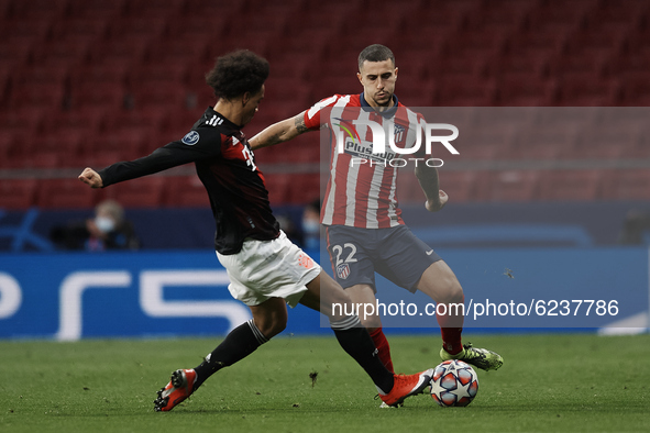 Mario Hermoso of Atletico Madrid and Leroy Sane of Bayern during the UEFA Champions League Group A stage match between Atletico Madrid and F...