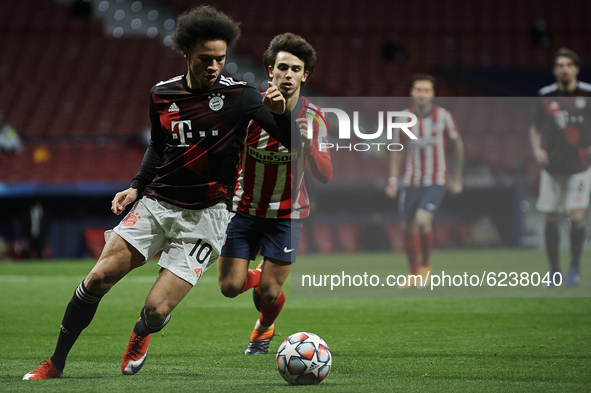Leroy Sane of Bayern and Joao Felix of Atletico Madrid compete for the ball during the UEFA Champions League Group A stage match between Atl...