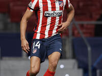 Marcos Llorente of Atletico Madrid runs with the ball during the UEFA Champions League Group A stage match between Atletico Madrid and FC Ba...