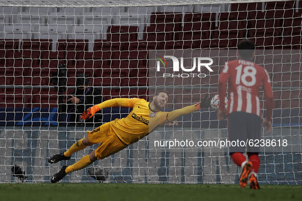Jan Oblak of Atletico Madrid can't stop the penalty during the UEFA Champions League Group A stage match between Atletico Madrid and FC Baye...
