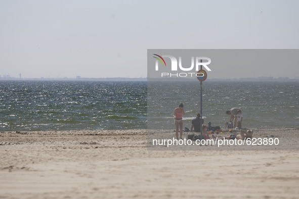 Gdynia, Poland 6th, June 2015 People enjoy hot and sunny weather in Northern Poland sunbathing on the Baltic sea beach in Gdynia.
meteorolog...