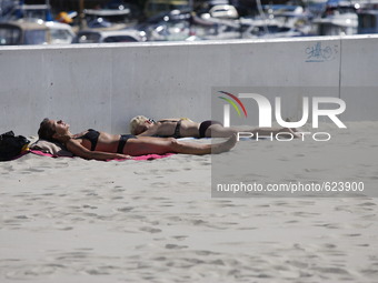 Gdynia, Poland 6th, June 2015 People enjoy hot and sunny weather in Northern Poland sunbathing on the Baltic sea beach in Gdynia.
meteorolog...
