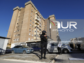 Police patrol during an intervention in an illegal cannabis plantation in a building located in the Almanjayar neighborhood in Granada, Spai...