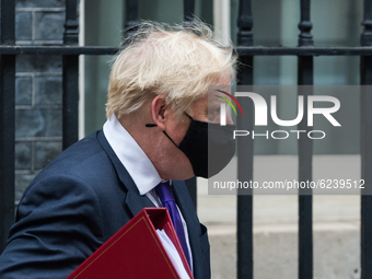 British Prime Minister Boris Johnson leaves 10 Downing Street for PMQs at the House of Commons on 02 December, 2020 in London, England. (