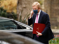 Secretary of State for Digital, Culture, Media and Sport Oliver Dowden, Conservative Party MP for Hertsmere, wears a face mask arriving on D...
