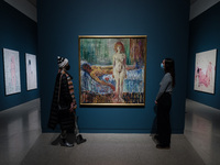 (EDITORIAL USE ONLY) Visitors look at ‘The Death of Marat’ (1907) by Edvard Munch during a photocall for the Tracey Emin / Edvard Munch: The...