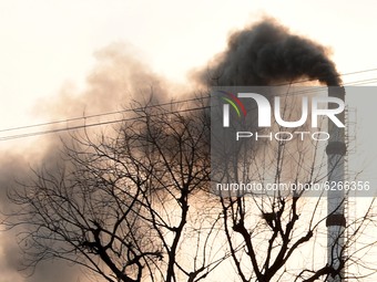 Smoke billows from a factory chimney on the outskirts of Bhilwara, Rajasthan, India on 12 December 2020. (