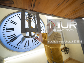 One of the workers of the Puerta del Sol bell tower, JesUs LOpez Tarradas, during the making of a report on the clock in Madrid's emblematic...