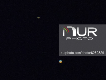 Saturn and Jupiter planets in L'Aquila, Italy, on december 20, 2020. The planets are getting closer every day until the historical conjuncti...