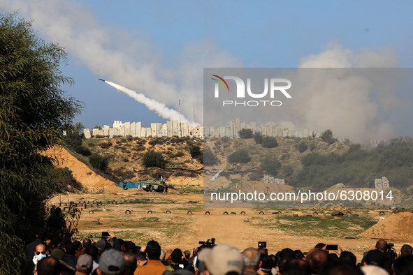 Rockets are fired during a military drill by Palestinian Islamist movement Hamas and other Palestinian armed factions in Gaza City on Decemb...