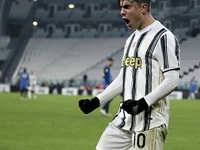 Paulo Dybala of Juventus F.C. celebrates after scoring their team's fourth goal during the Serie A match between Juventus and Udinese Calcio...