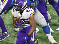 Minnesota Vikings running back Alexander Mattison (25) carries the ball during the second half of an NFL football game between the Detroit L...