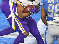 Minnesota Vikings running back Alexander Mattison (25) brings the ball into the end zone for a touchdown during the second half of an NFL fo...