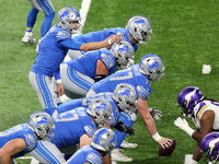 Detroit Lions quarterback Matthew Stafford (9) signals before a play during the second half of an NFL football game between the Detroit Lion...