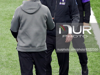 Detroit Lions head coach Darrell Bevell shakes hands with Minnesota Vikings head coach Mike Zimmer at the conclusion of an NFL football game...