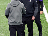 Detroit Lions head coach Darrell Bevell shakes hands with Minnesota Vikings head coach Mike Zimmer at the conclusion of an NFL football game...