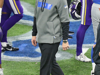 Detroit Lions head coach Darrell Bevell walks off the field at the conclusion of an NFL football game between the Detroit Lions and the Minn...
