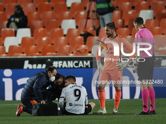 Kevin Gameiro of Valencia lies injured on the pitch during the La Liga Santander match between Valencia CF and Cadiz CF at Estadio Mestalla...