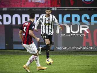 Juventus forward Cristiano Ronaldo (7) fights for the ball against Milan defender Diogo Dalot (5) during the Serie A football match n.16 MIL...