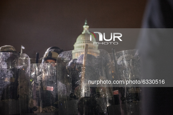 The National Guard near the U.S. Capitol on January 06, 2021 in Washington, DC. The protesters stormed the historic building, breaking windo...
