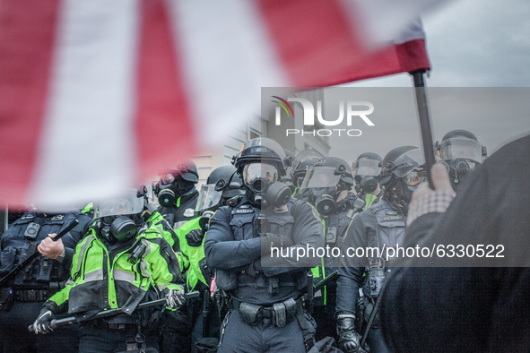 Riot police formed heavy lines near the U.S. Capitol on January 06, 2021 in Washington, DC. The protesters stormed the historic building, br...