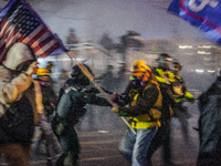 Capitol Police and MPD used physical force and tear gas to force the Trump supporters further away from the U.S Capitol, on January 06, 2021...