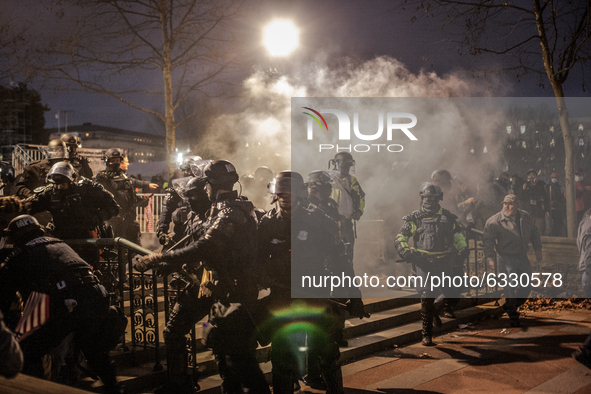 Capitol Police and MPD near the U.S Capitol, on January 06, 2021 in Washington, DC. The protesters stormed the historic building, breaking w...