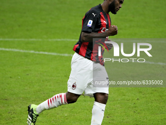 Frank Kessie of AC Milan celebrates after scoring the his team's second goal during the Serie A match between AC Milan and Torino FC at Stad...