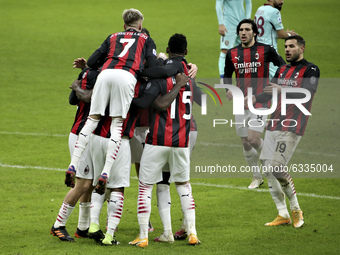 Frank Kessie of AC Milan celebrates with team-mates after scoring the his goal during the Serie A match between AC Milan and Torino FC at St...