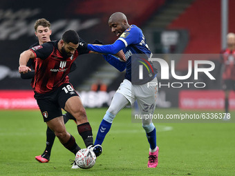 Oldham Athletic's Dylan Bahamboula tussles with Cameron Carter-Vickers of Bournemouth during the FA Cup match between Bournemouth and Oldha...