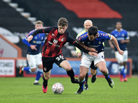 Oldham Athletic's Ben Garrity tussles with Gavin Kilkenny of Bournemouth  during the FA Cup match between Bournemouth and Oldham Athletic at...