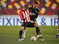  Marcus Forss of Brentford and Nathan Wood of Middlesbrough battle for the ball during the FA Cup match between Brentford and Middlesbrough...
