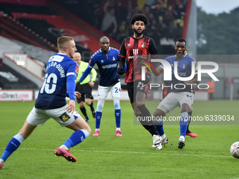  Philip Billing of Bournemouth tussles with Oldham Athletic's Brice Ntambwe during the FA Cup match between Bournemouth and Oldham Athletic...