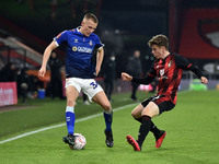  Oldham Athletic's Tom Hamer tussles with Gavin Kilkenny of Bournemouth during the FA Cup match between Bournemouth and Oldham Athletic at t...