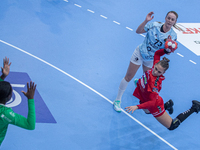 Fanny Helembai of Váci NKSE shoots the ball during the EHF-1 Group Phase match at the European League between Váci NKSE and Paris 92 at the...