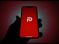 The Parler logo is seen on an Apple iPhone in this photo illustration in Warsaw, Poland on January 10, 2021. The Parler app, developed as an...