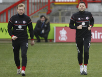 Brothers Mark Wright and Josh Wright of Crawley Town warms up during The FA Cup Third Round between Crawley Town and Leeds United at The Peo...
