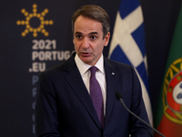Greek Prime Minister Kyriakos Mitsotakis and Portuguese Prime Minister Antonio Costa (not seen) hold a joint press conference after their me...