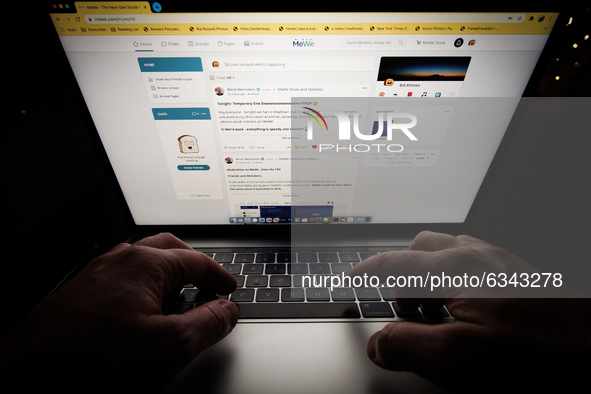 The MeWe social networking platform is seen on an Apple laptop in this photo illustration in Warsaw, Poland on January 12, 2021. The alt-tec...