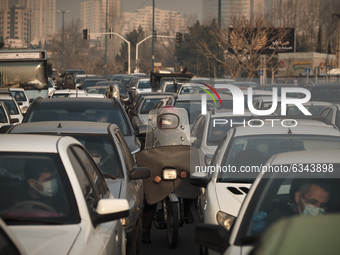Vehicles stop on a road in northwestern Tehran during a polluted air, following the COVID-19 outbreak in Iran, on January 12, 2021. Tehran i...