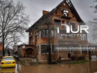 Flooded house in the village of Petarch, Sofia region, Bulgaria 12 January, 2021 (