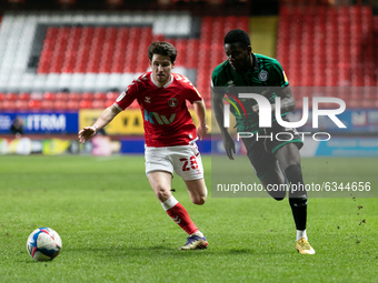Kwadwo Baah of Rochdale and Paul Smyth of Charlton Athletic compete for the ball during the Sky Bet League 1 match between Charlton Athletic...